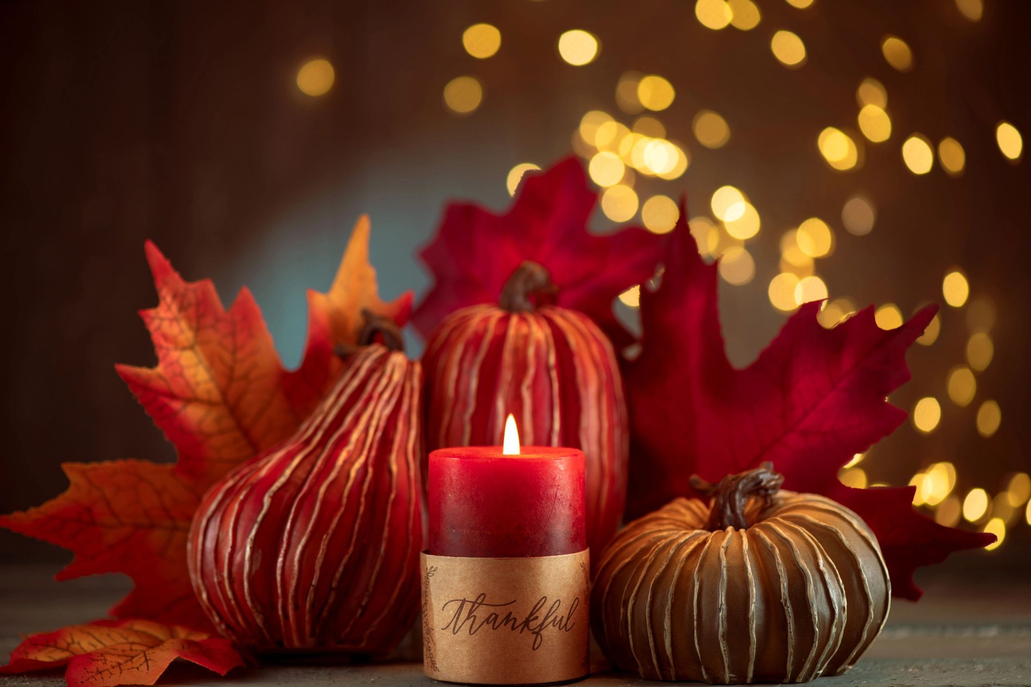 Candles styled in a warm home setting