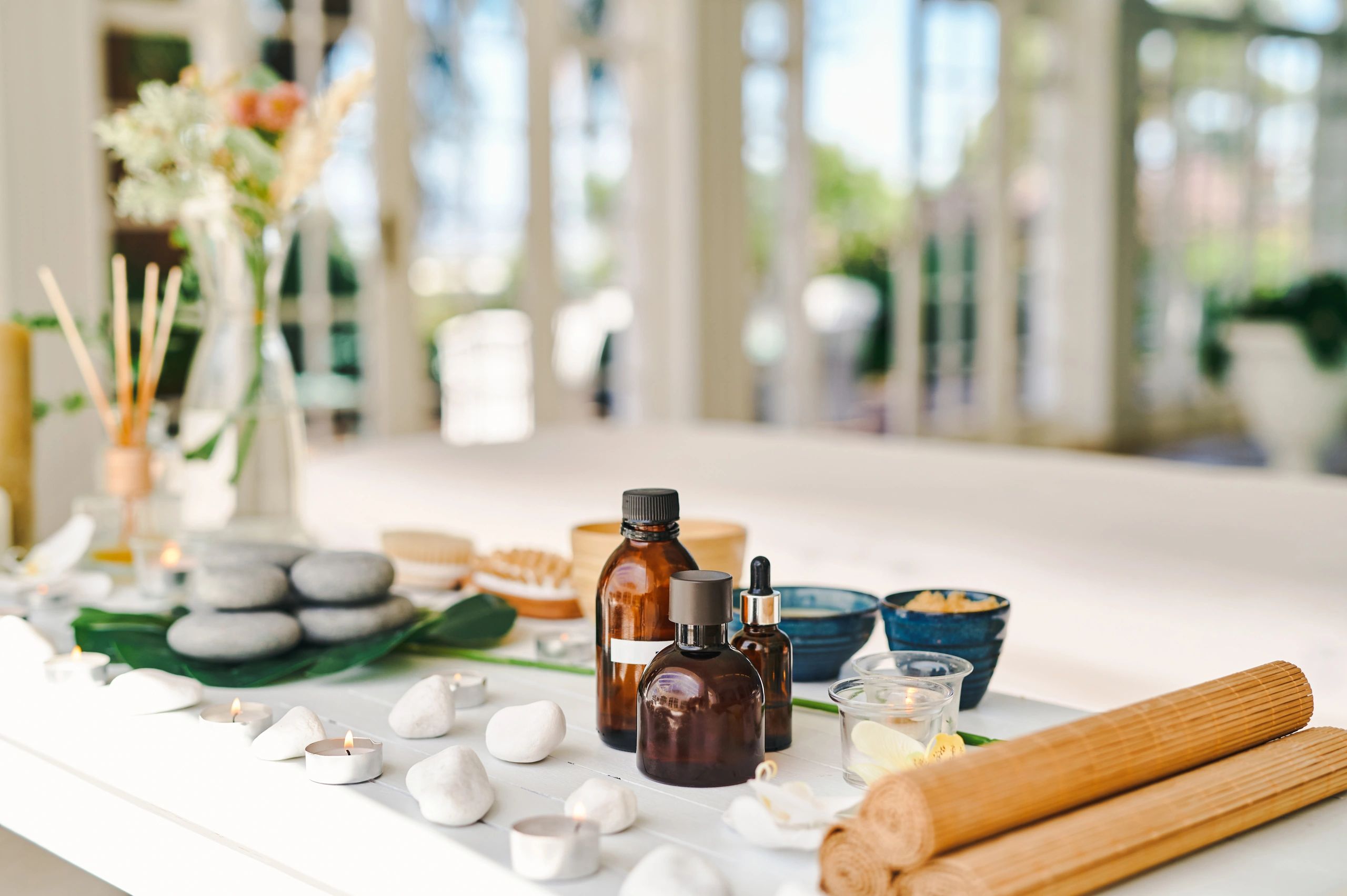 Curated self-care products arranged on a spa table